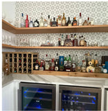 Handcrafted reclaimed wood wine bottle rack and matching tiered bar shelves for bottle storage and display