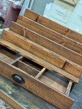 Front view of handcrafted solid wood fragrance display shelf with large storage drawer in special walnut finish and oil rubbed bronze drawer pull