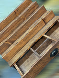 Front view of handcrafted solid wood fragrance display shelf with large storage drawer in special walnut finish and oil rubbed bronze drawer pull