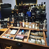 Handcrafted reclaimed wood fragrance display and storage shelf with hidden drawer