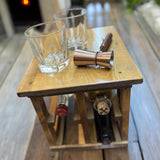Handcrafted countertop wine or liquor bottle storage rack with wood storage shelf on top