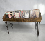 Handcrafted reclaimed wood vinyl record storage and display stand with four compartments on black hairpin legs